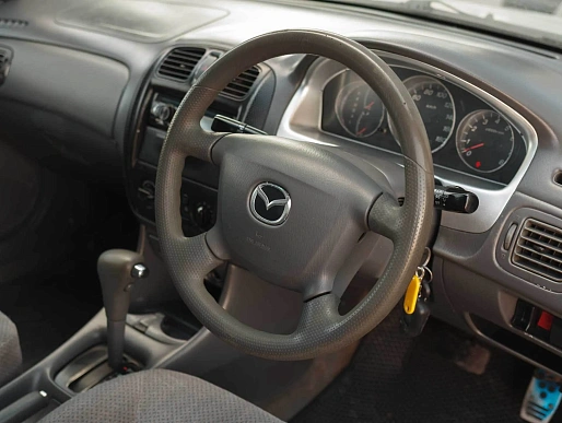 Купить Мазда Фамилиа 1999г.